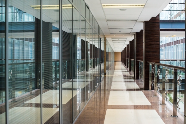 https://blog.mastercraftusa.com/hubfs/business-center-corridor-interior-glass.jpg#keepProtocol